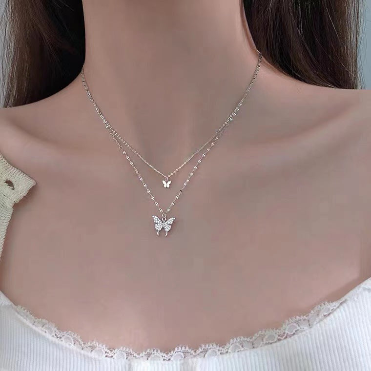 Elegant Silver Butterfly Pendant Necklace with Crystal Detailing