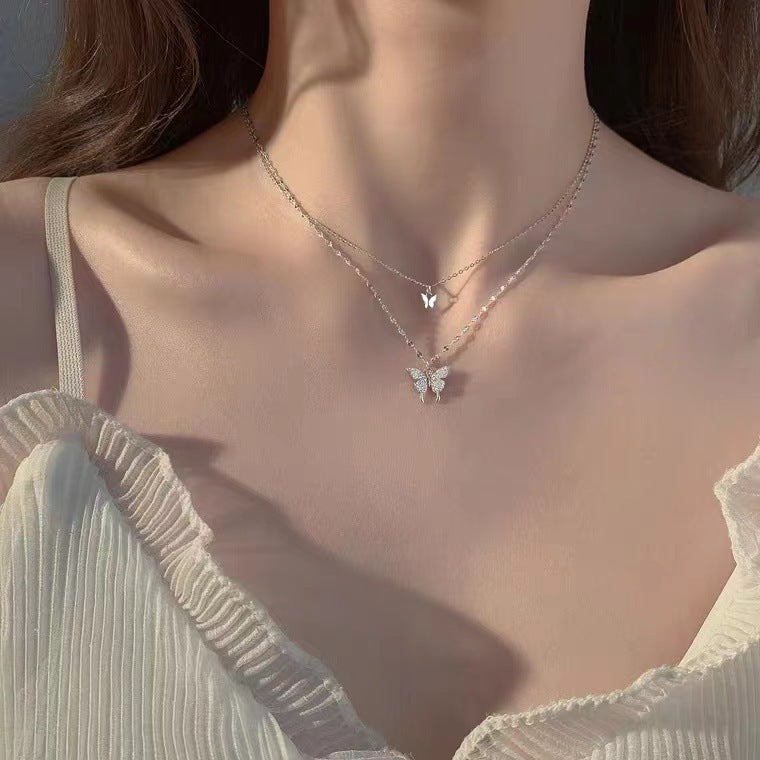 Elegant Silver Butterfly Pendant Necklace with Crystal Detailing