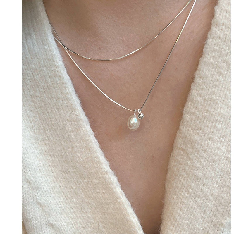 Elegant Double-Layered Silver Necklace with Pearl Charm